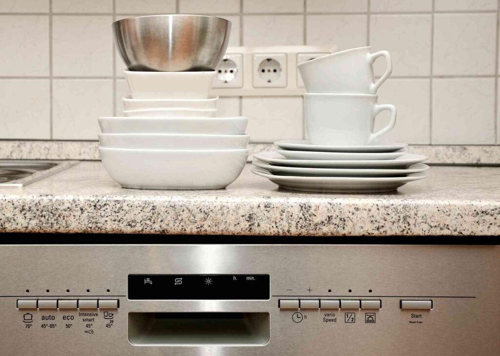 A dishwasher and dishes.